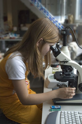 Kid on Microscope